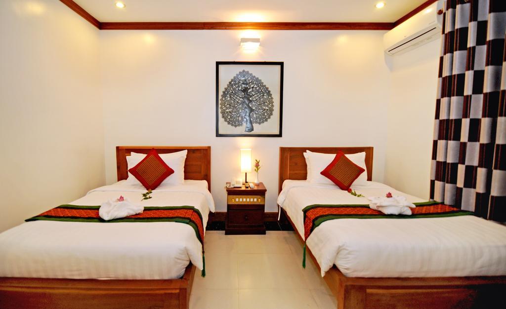 Hotel Visoth Boutique Ciudad de Siem Riep Habitación foto