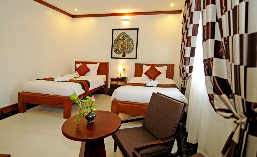 Hotel Visoth Boutique Ciudad de Siem Riep Habitación foto