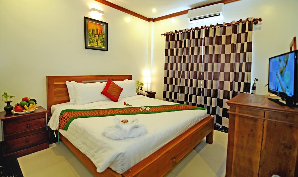 Hotel Visoth Boutique Ciudad de Siem Riep Habitación foto